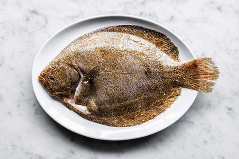 BBQ whole brill with lemon and herb butter