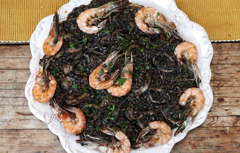 Black Squid Ink risotto with squid & grilled prawns
